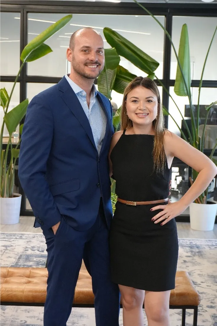 The founders of Our Circle Mortgage in their Florida office